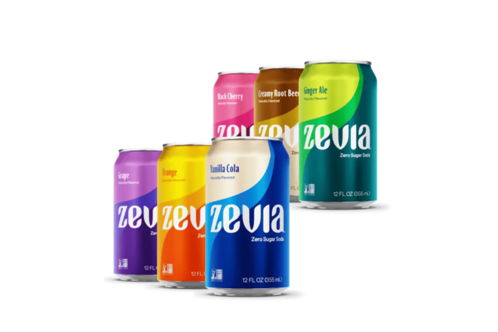 Zevia Diet cans with citrus fruits on kitchen table in natural light
