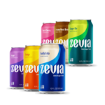 Zevia Diet cans with citrus fruits on kitchen table in natural light
