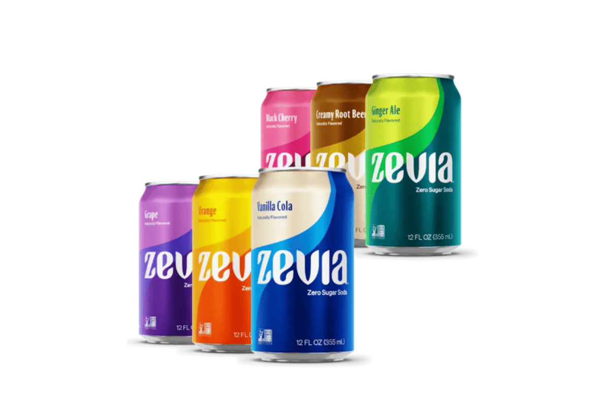 Zevia Diet cans with citrus fruits on kitchen table in natural light